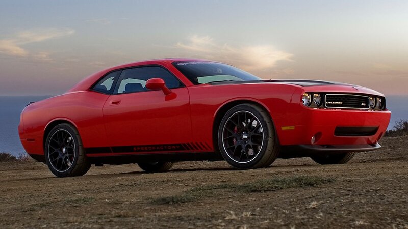 Red Dodge Challenger on cliff