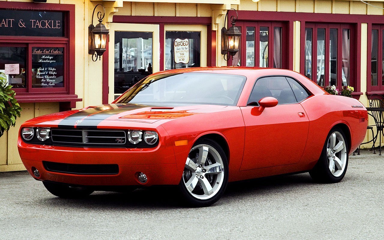 Red Dodge Challenger parked outside