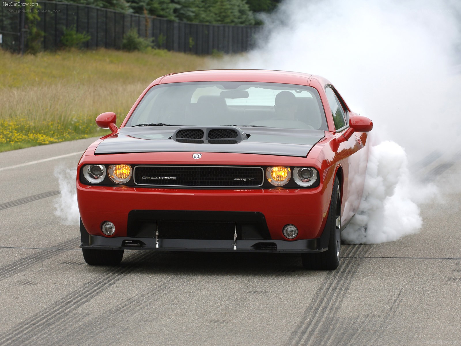 Red Dodge Challenger SRT burnout