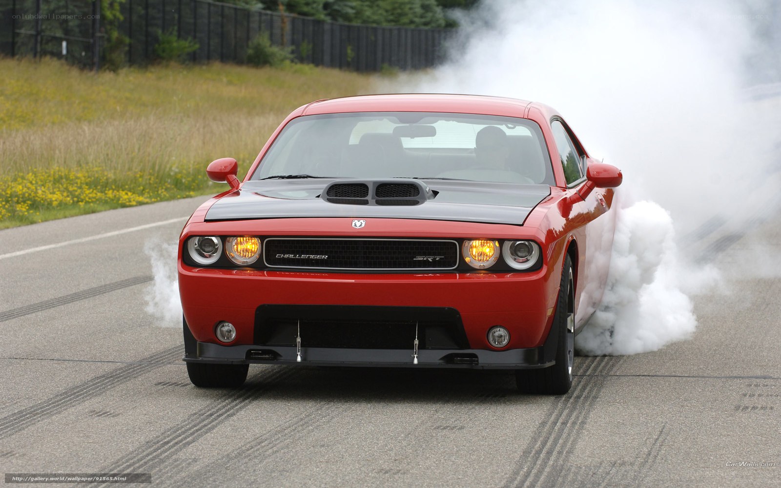 Red Dodge Challenger SRT burnout