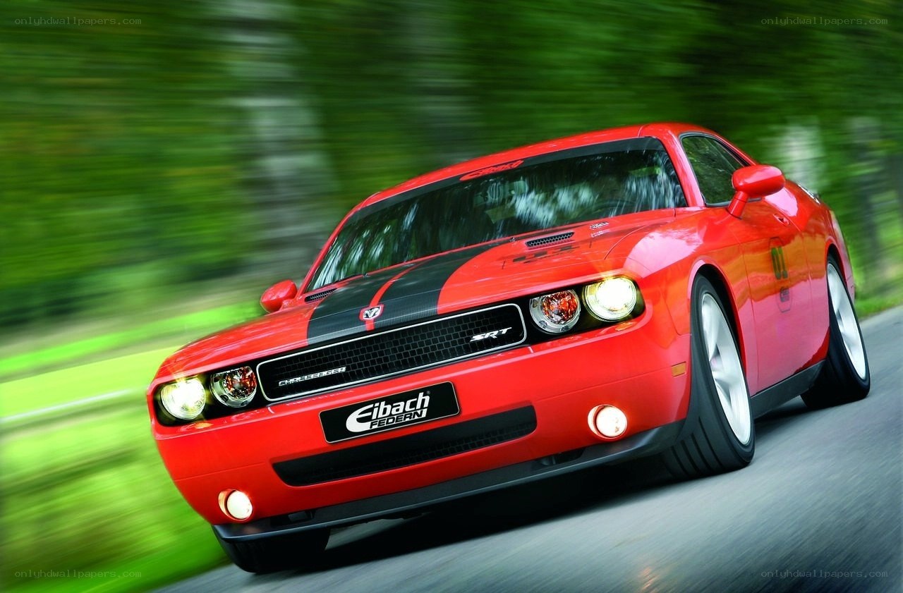 Red Dodge Challenger SRT in motion