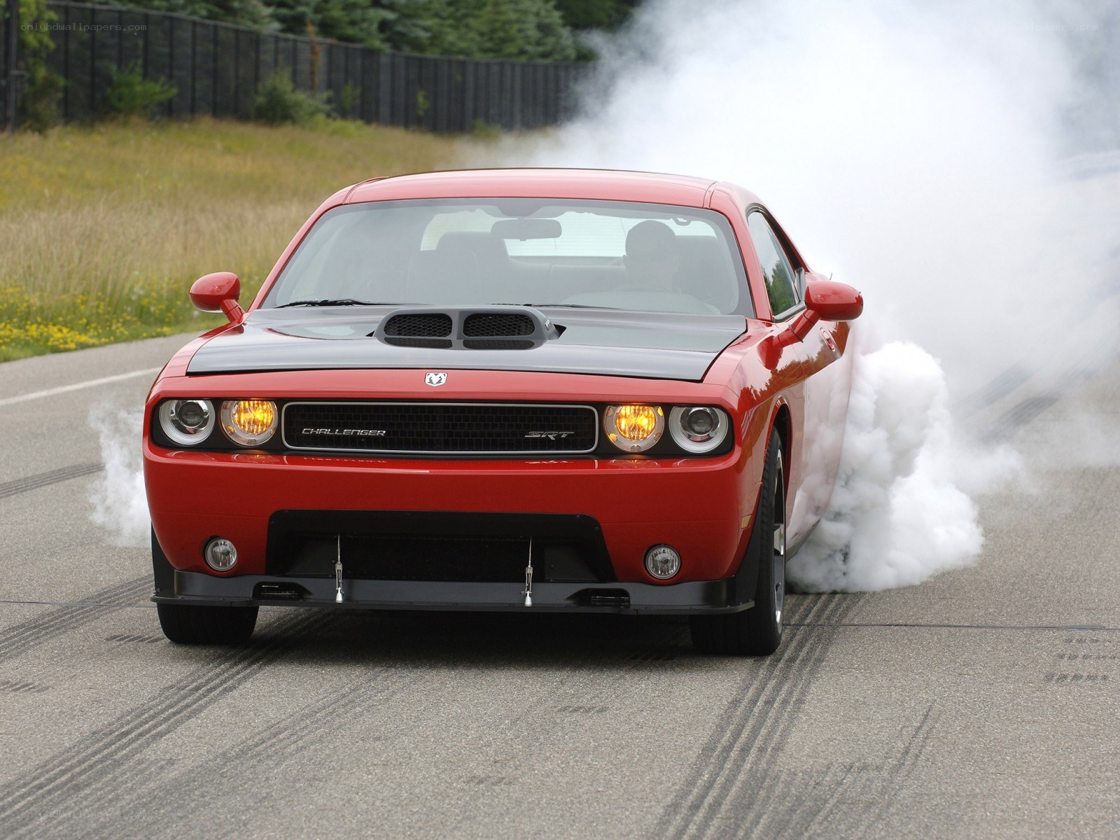 Red Dodge Challenger SRT8 burnout