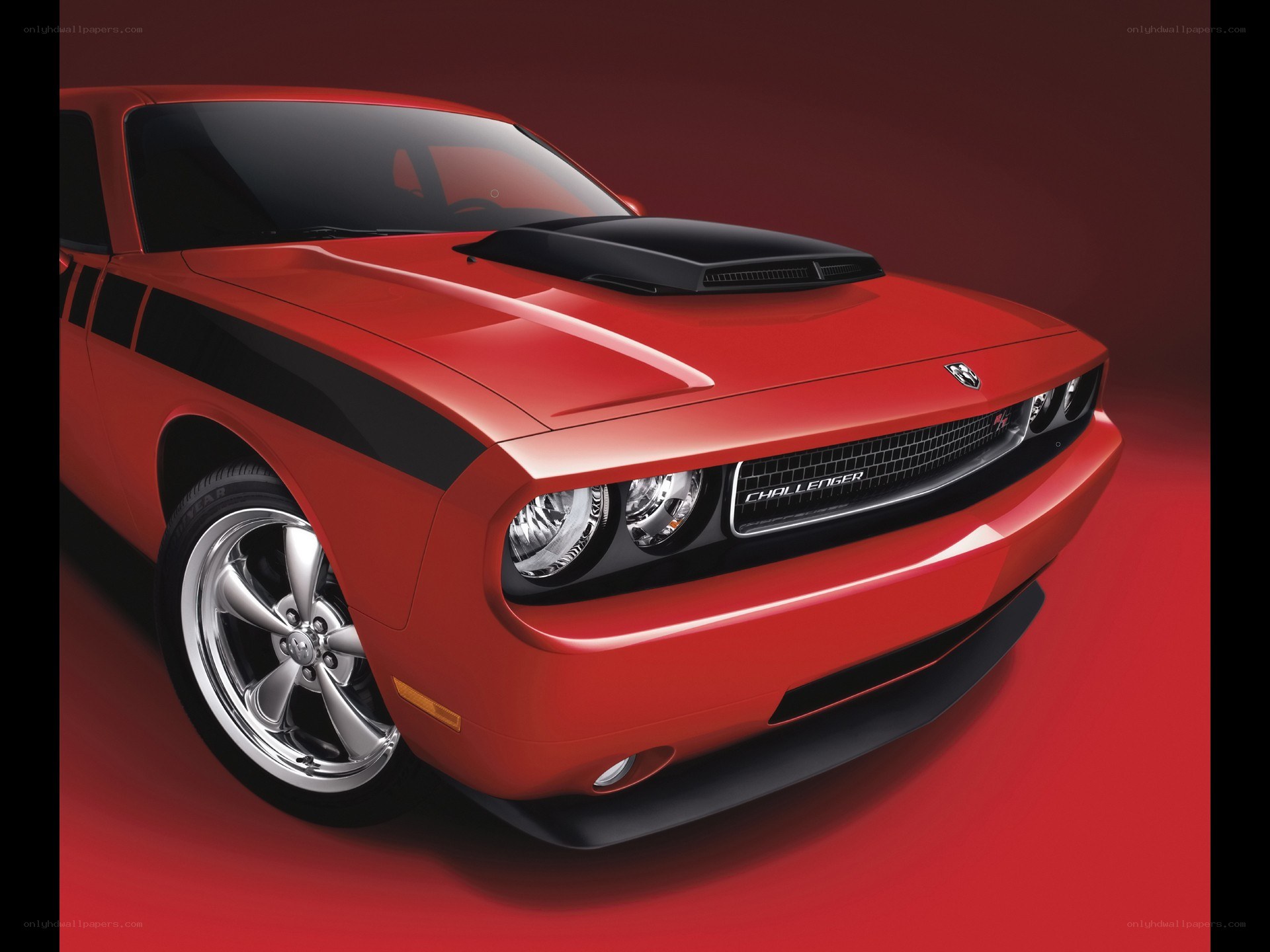 Red Dodge Challenger with black stripes
