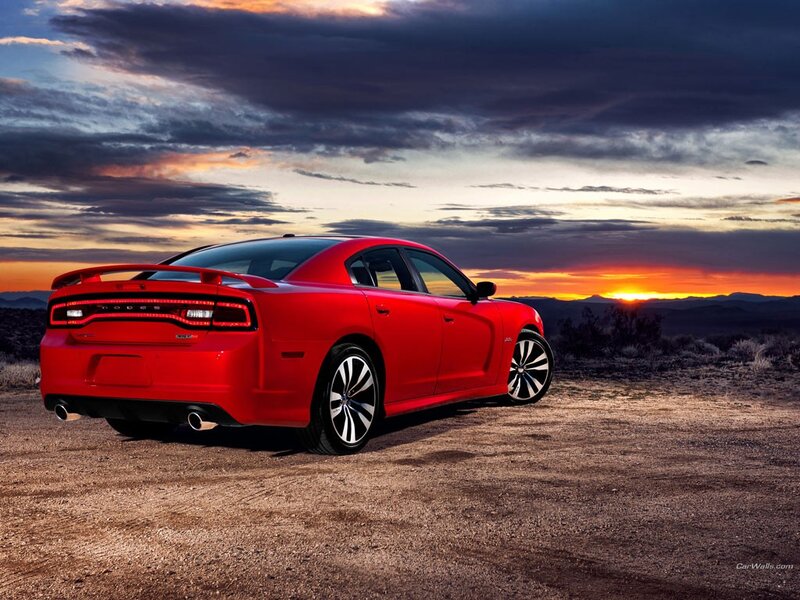 Red Dodge Charger at sunset