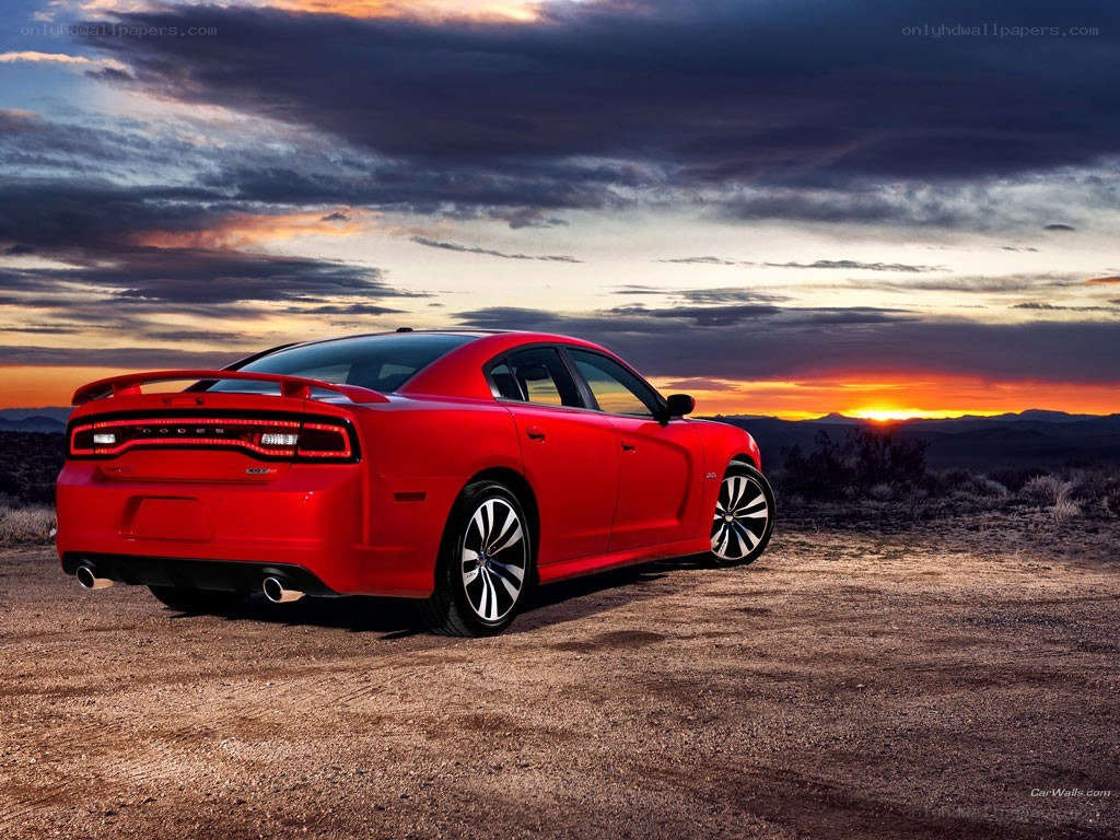 Red Dodge Charger at sunset