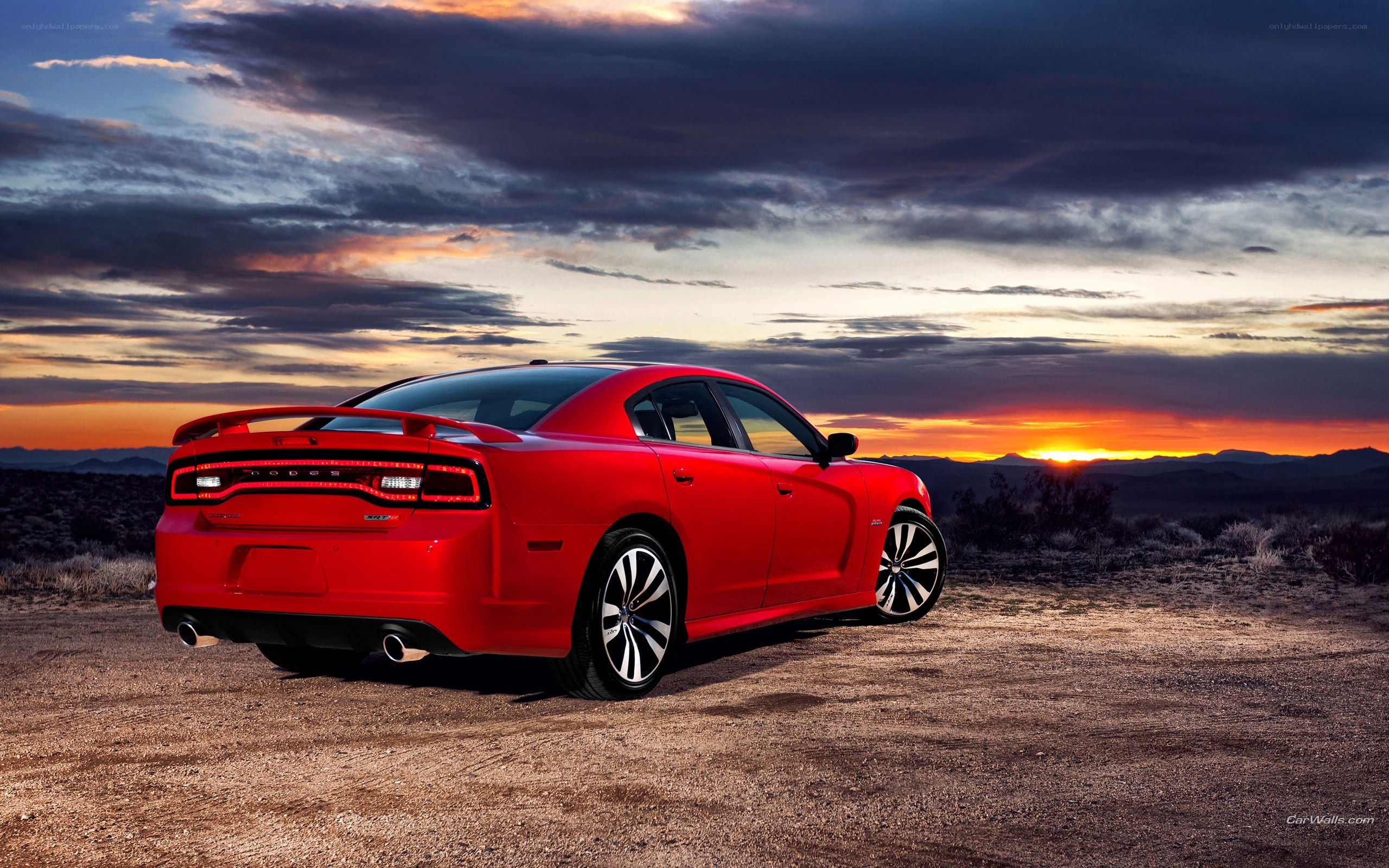 Red Dodge Charger at sunset