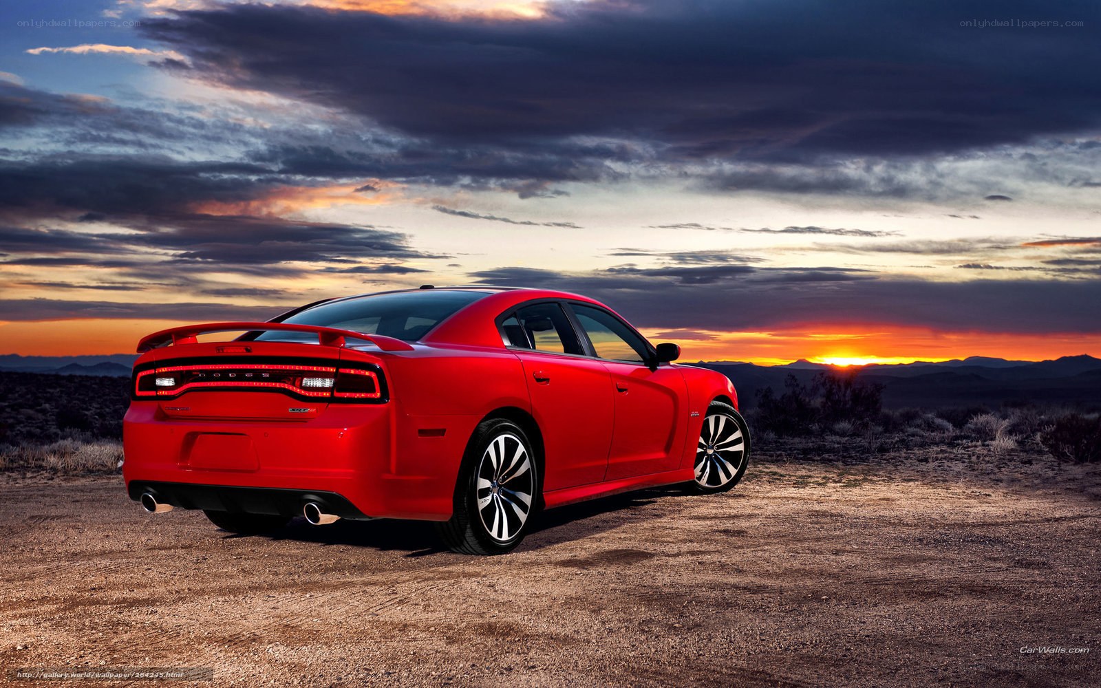 Red Dodge Charger at sunset