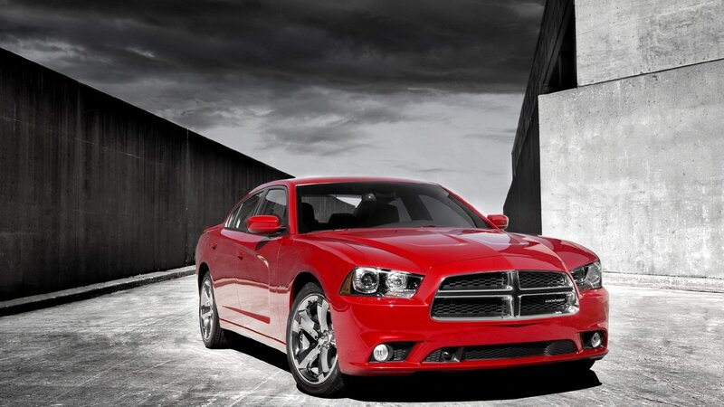 Red Dodge Charger in urban setting