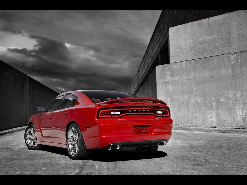 Red Dodge Charger in urban setting