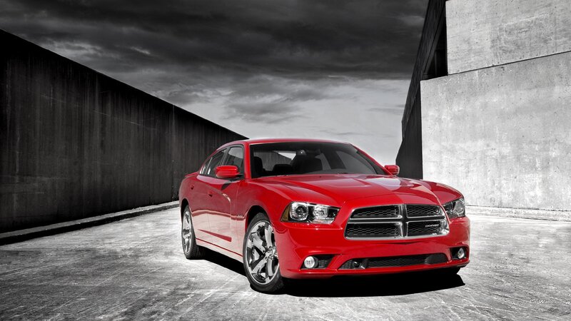 Red Dodge Charger in urban setting