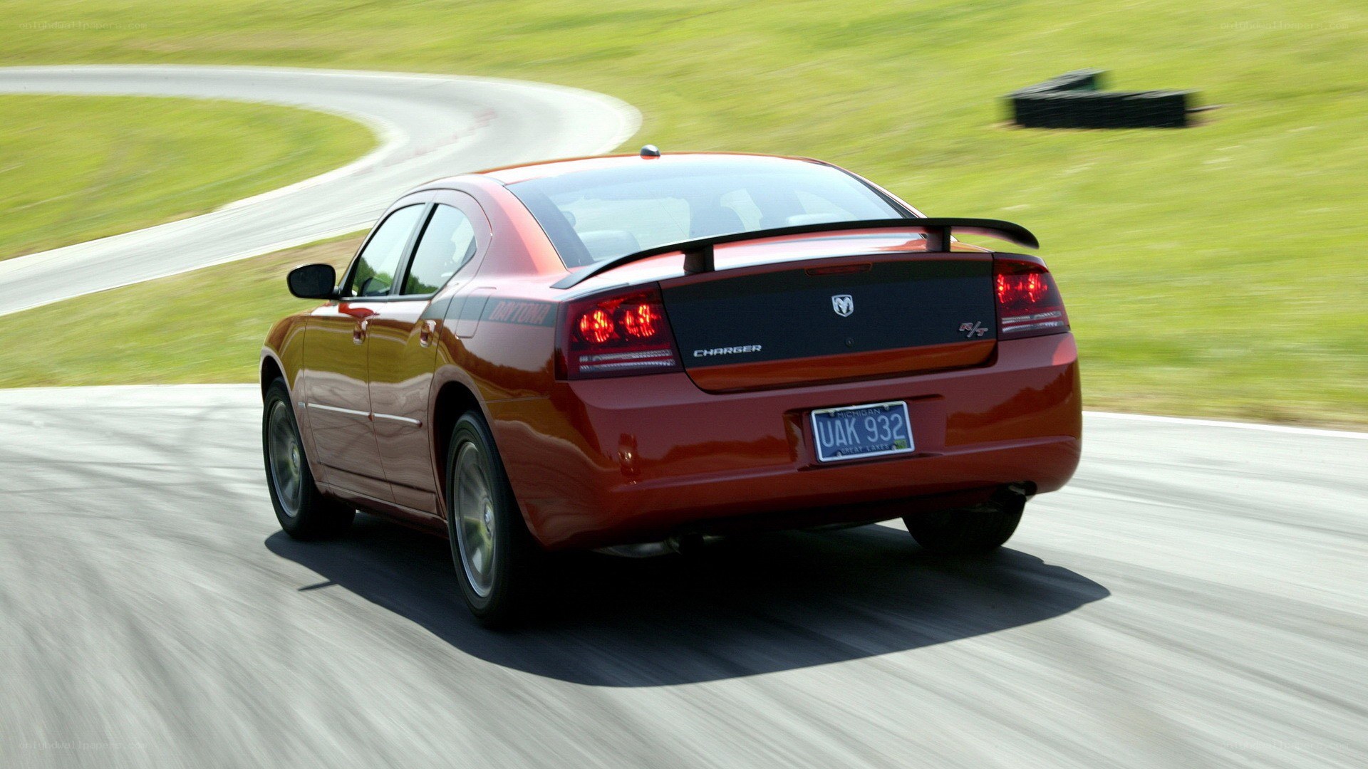 red dodge charger on track
