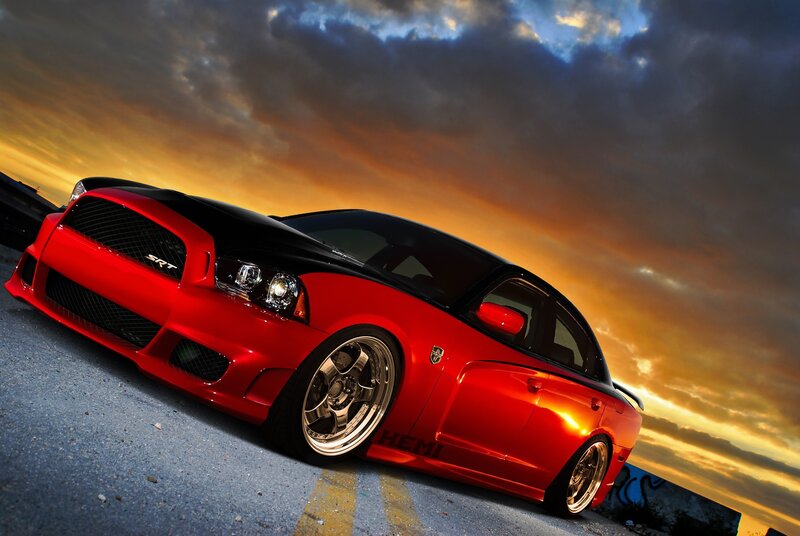 Red Dodge Charger SRT at sunset