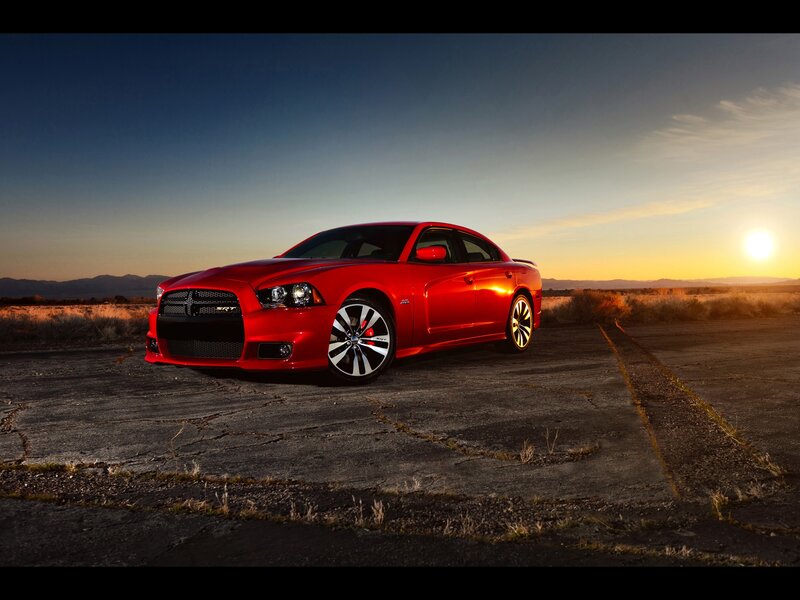 Red Dodge Charger SRT8 at sunset