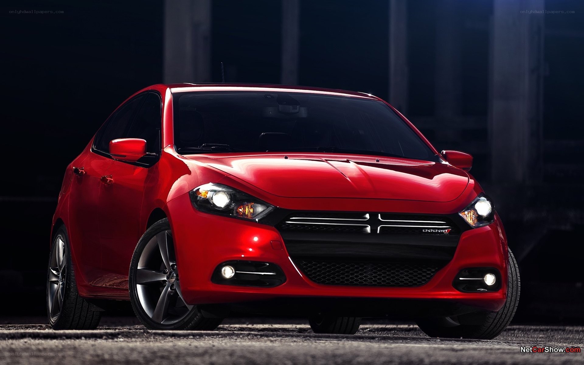Red Dodge Dart in dark setting