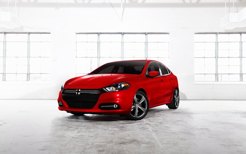 Red Dodge Dart in warehouse