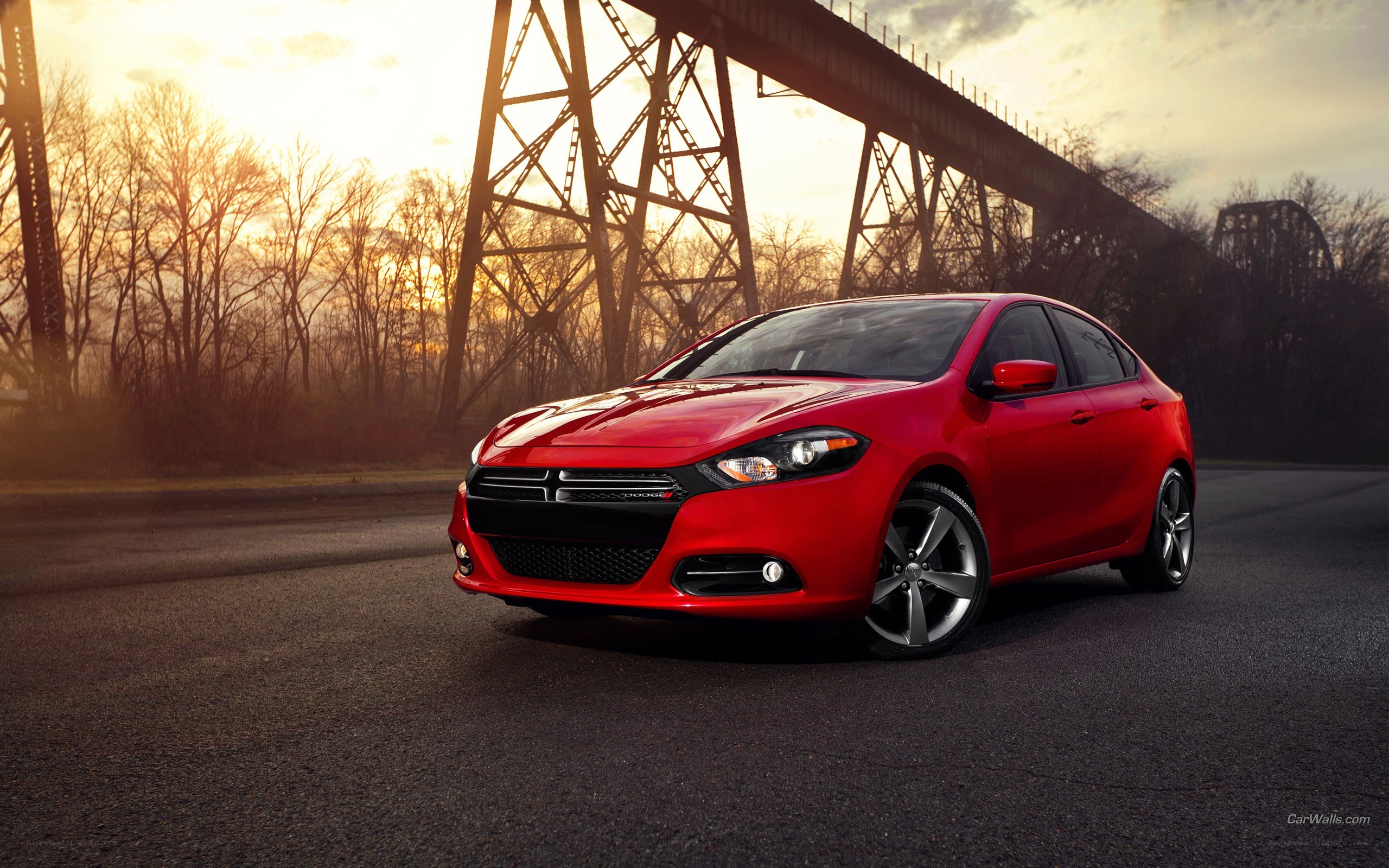Red Dodge Dart on road