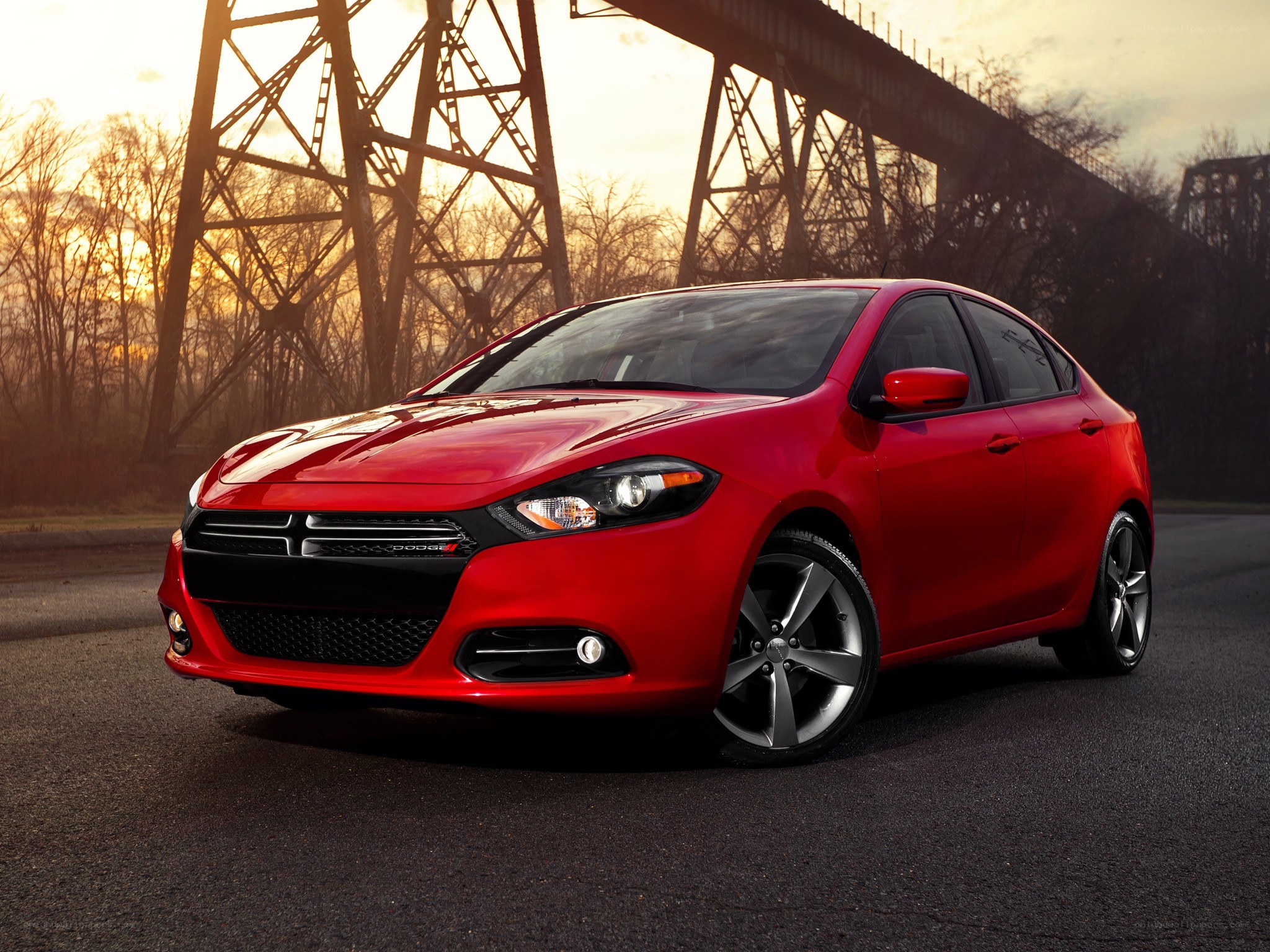 Red Dodge Dart on road