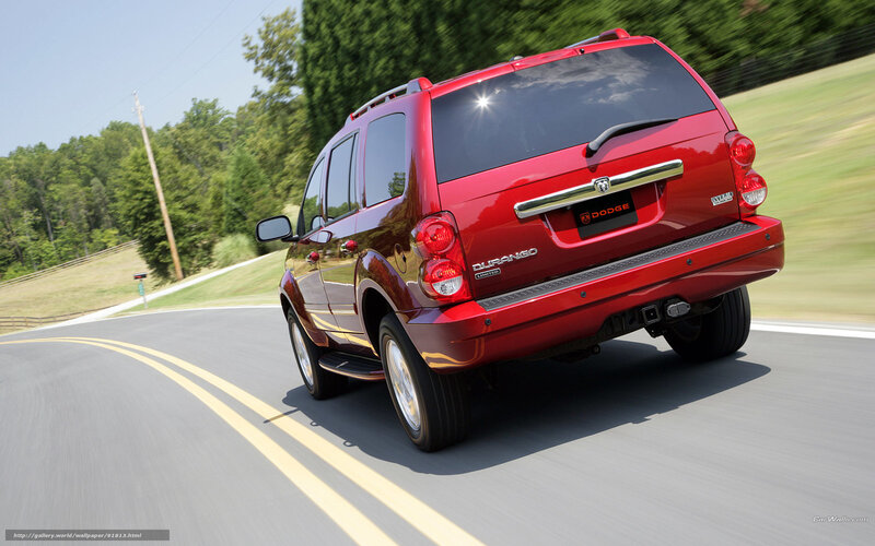 Red Dodge Durango on a country road