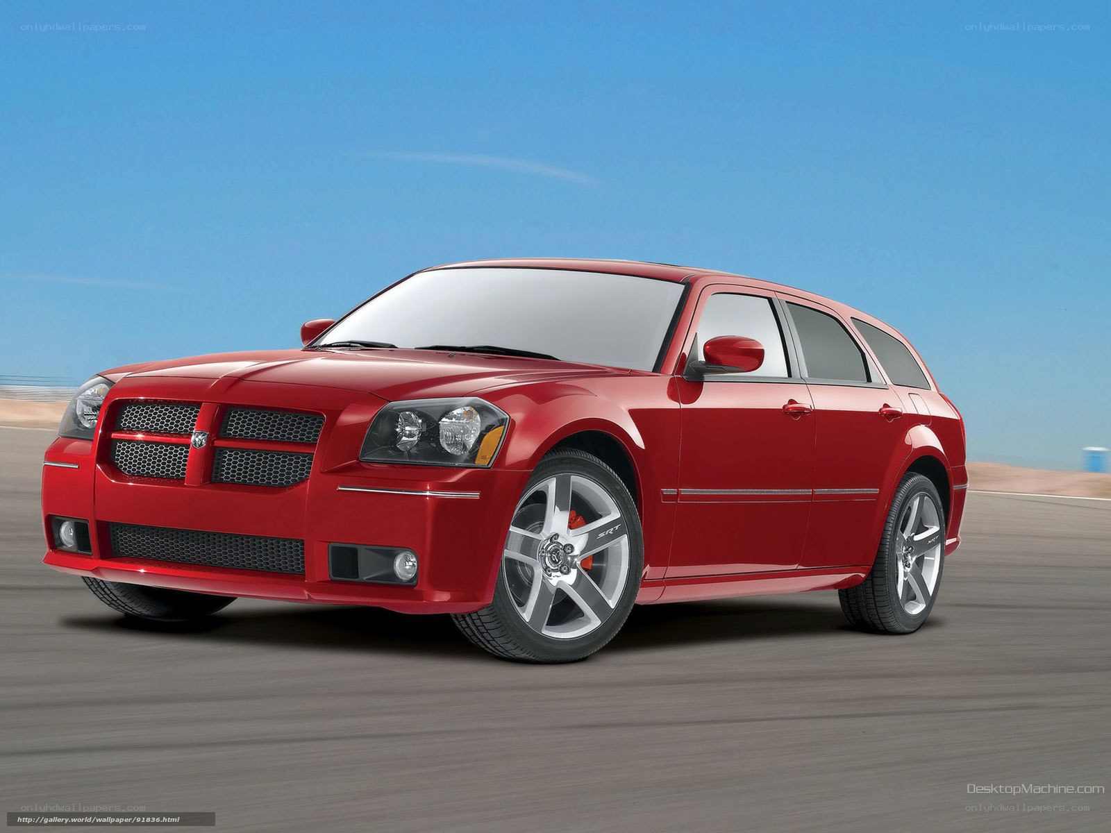 Red Dodge Magnum in motion