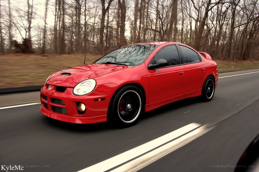 red dodge neon in motion