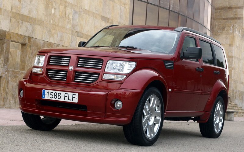 Red Dodge Nitro Suv — Neutral, Afternoon, Photograph