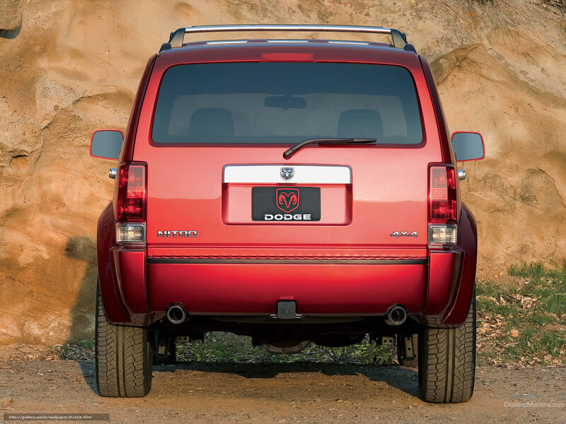 Red Dodge Nitro SUV rear view
