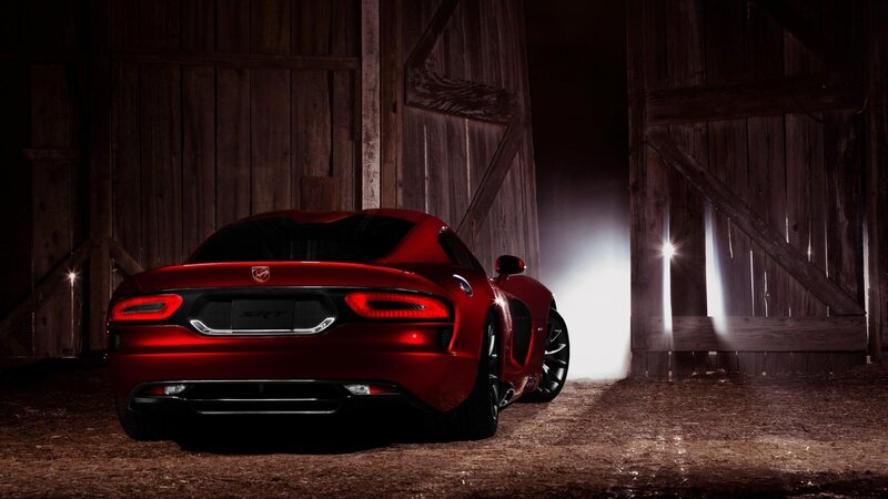 Red Dodge SRT in a barn