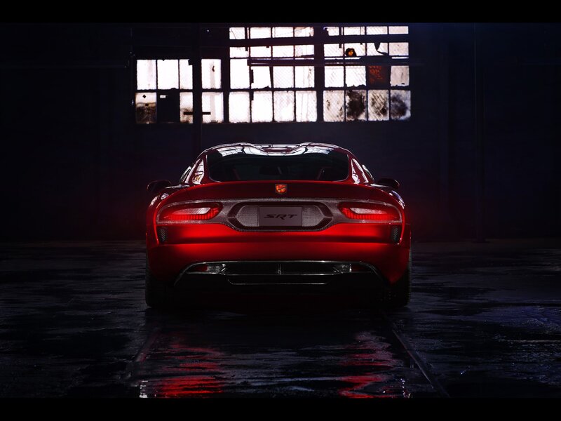 Red Dodge SRT in dark garage