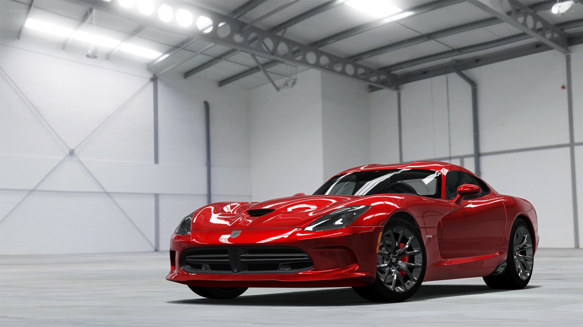 Red Dodge Viper in a warehouse