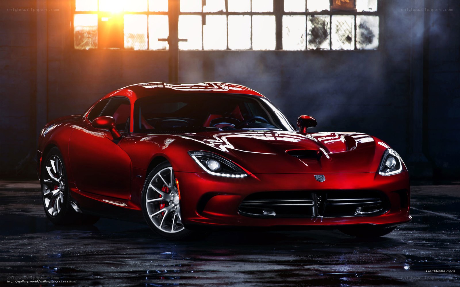 Red Dodge Viper in a warehouse