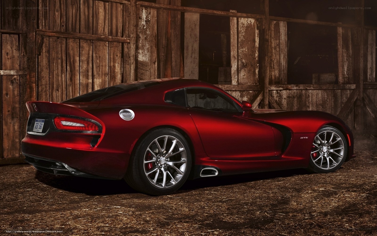Red Dodge Viper in barn