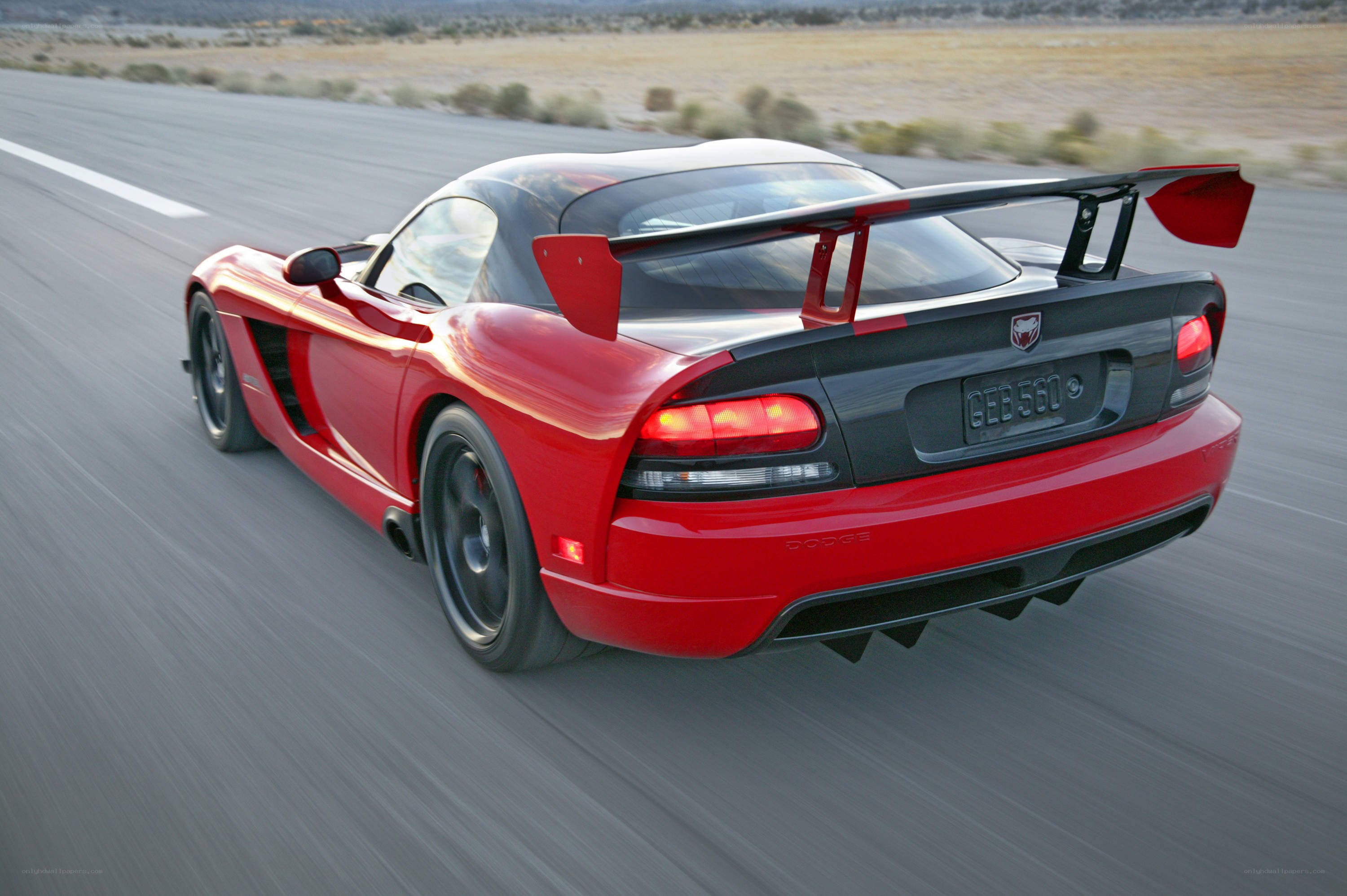Red Dodge Viper in motion