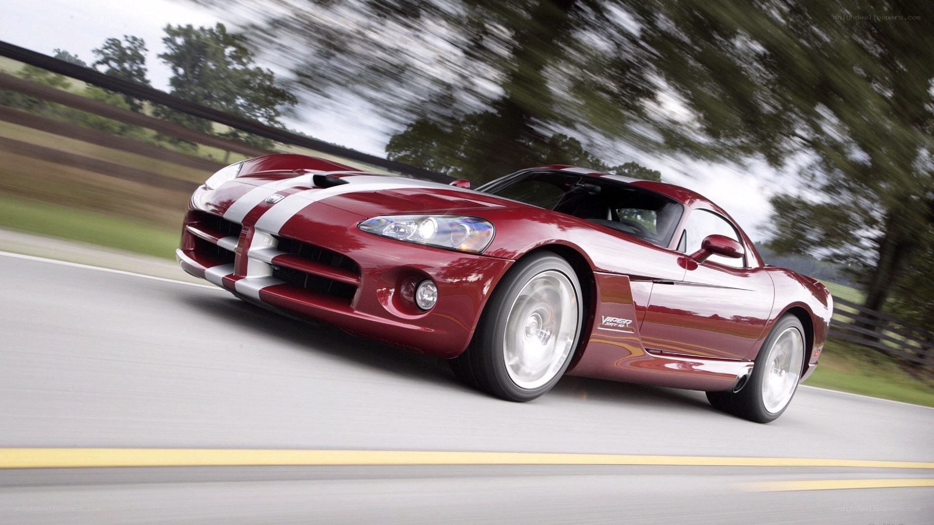 Red Dodge Viper in motion
