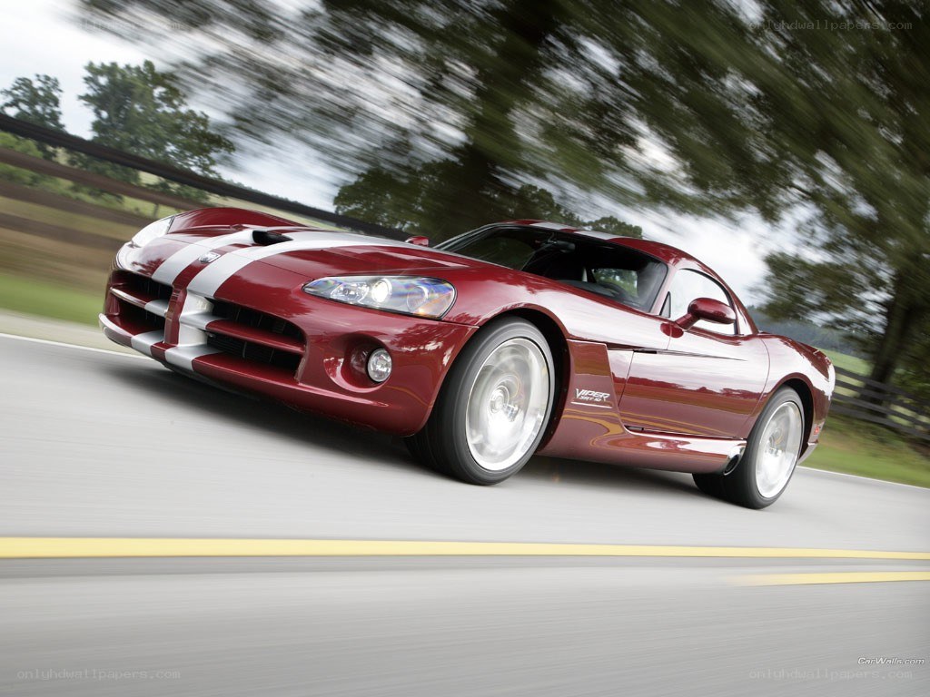Red Dodge Viper in motion