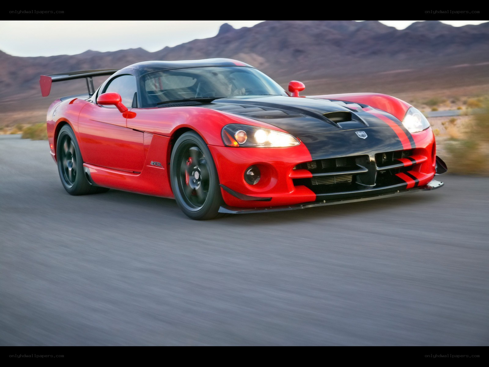 Red Dodge Viper in motion