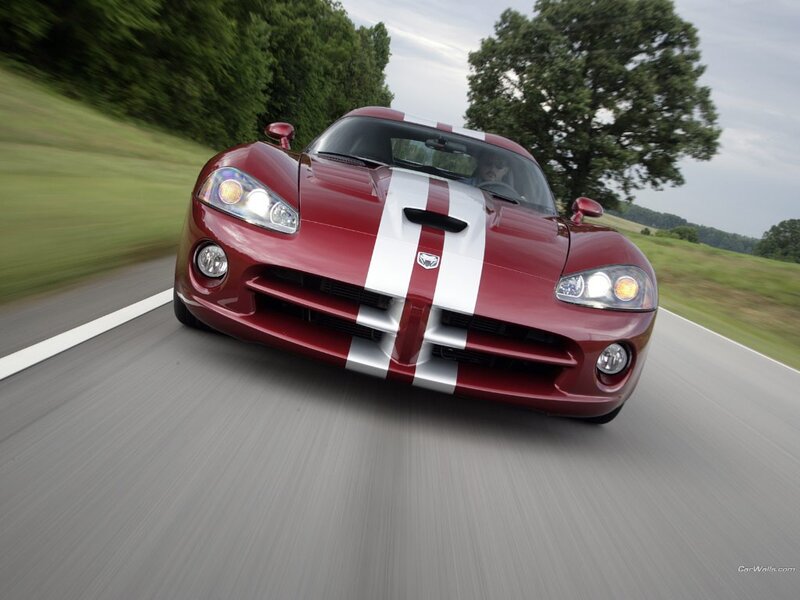 Red Dodge Viper on a country road