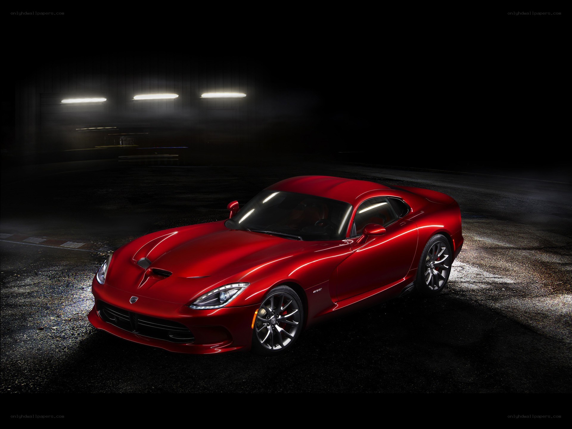 Red Dodge Viper on a racetrack