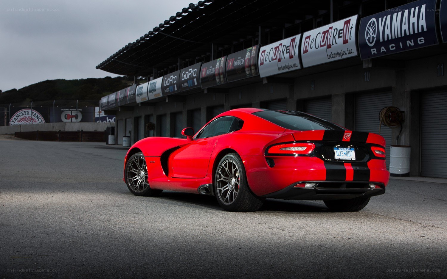 Red Dodge Viper on a racetrack