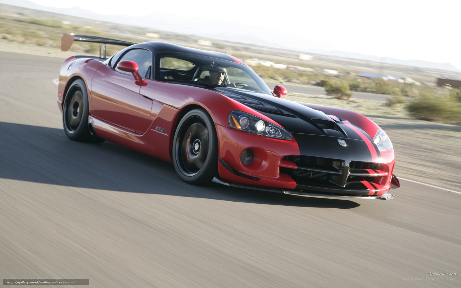 Red Dodge Viper on a racetrack