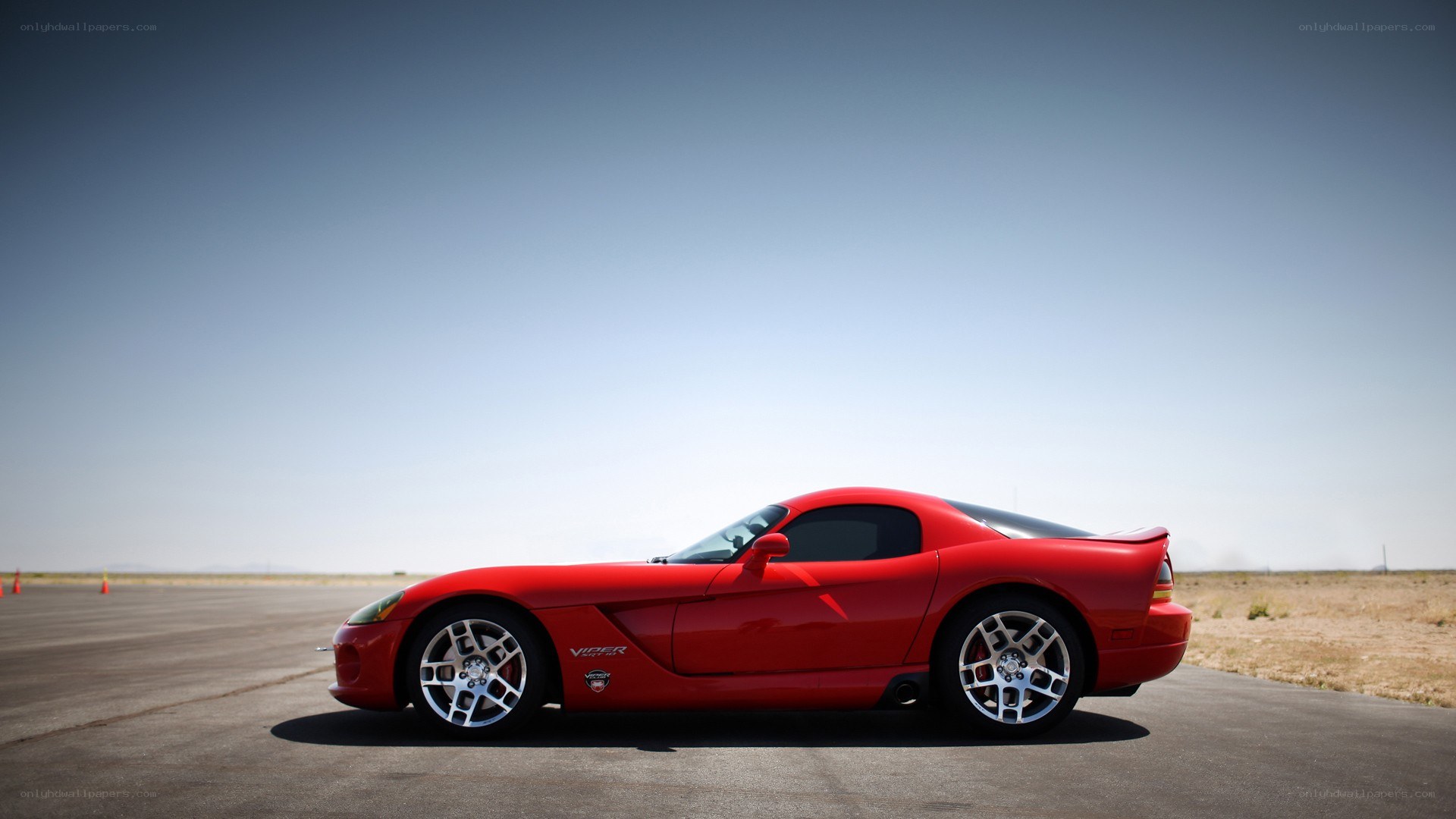 Red Dodge Viper on a runway
