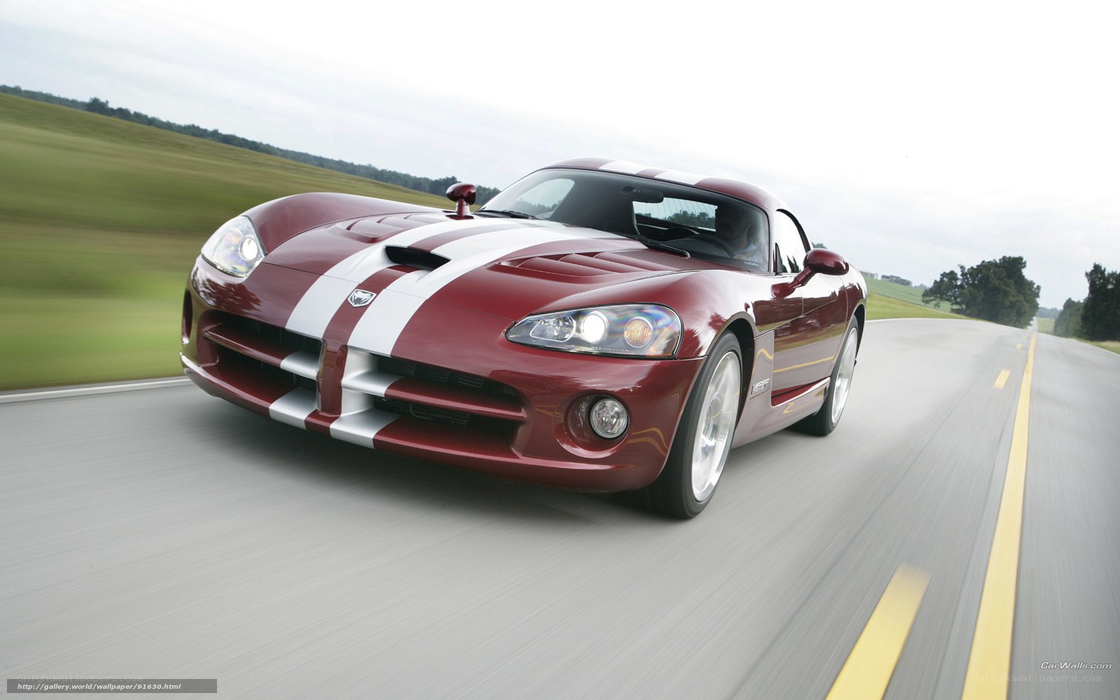 Red Dodge Viper on country road