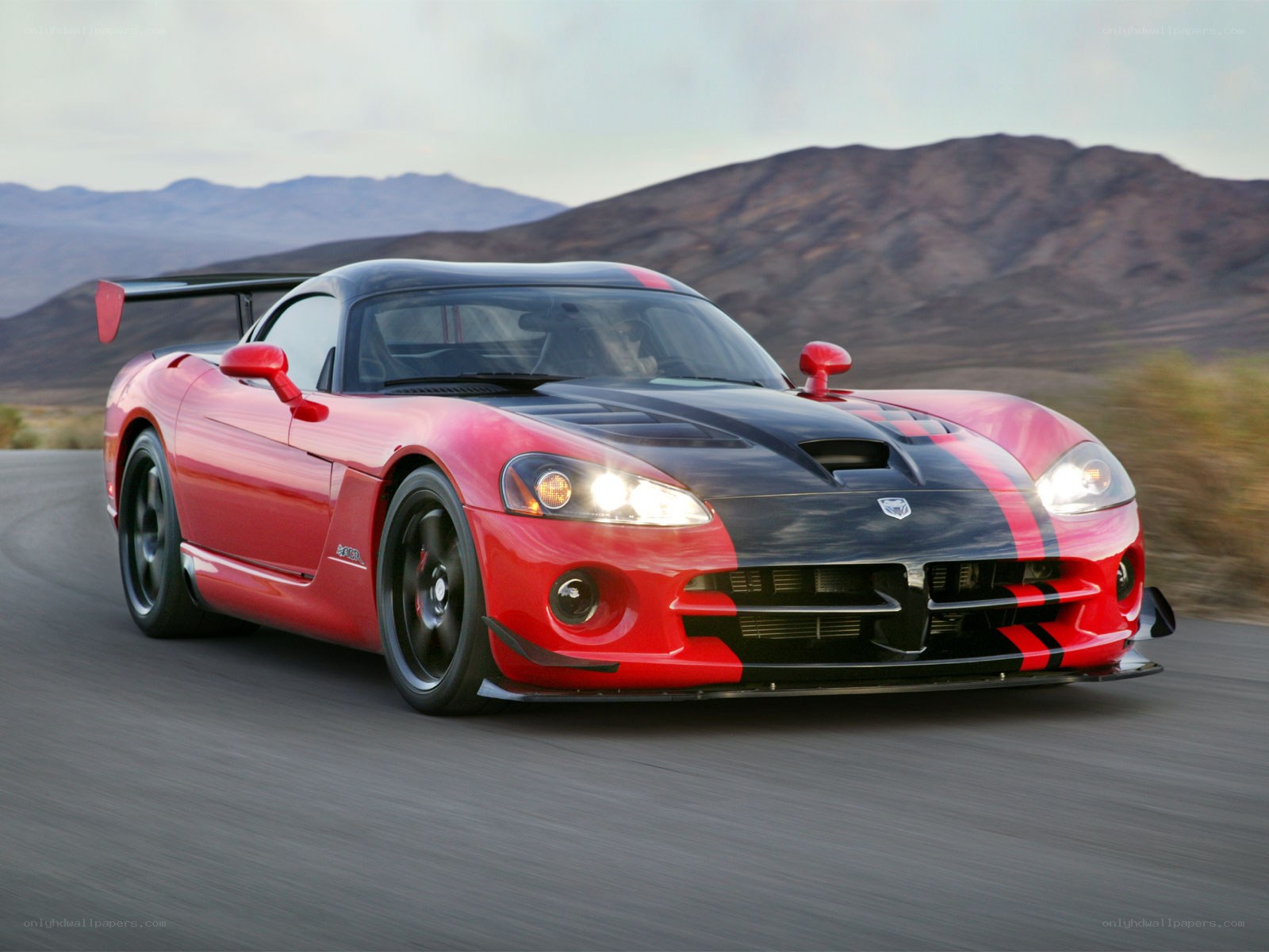 Red Dodge Viper on desert road
