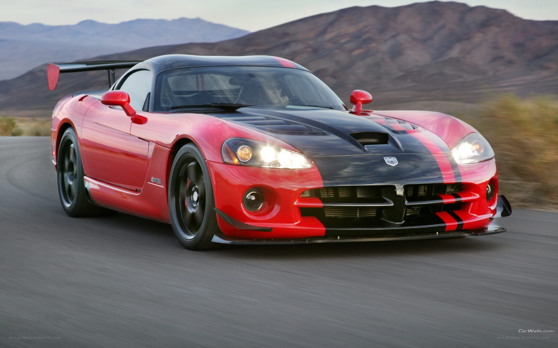 red dodge viper on desert road