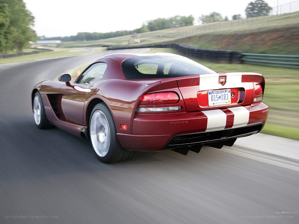 Red Dodge Viper on racetrack
