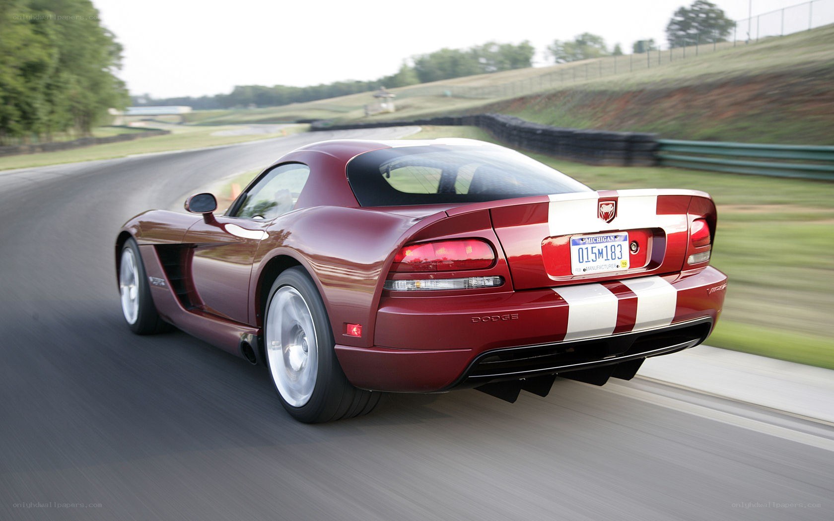 red dodge viper on racetrack