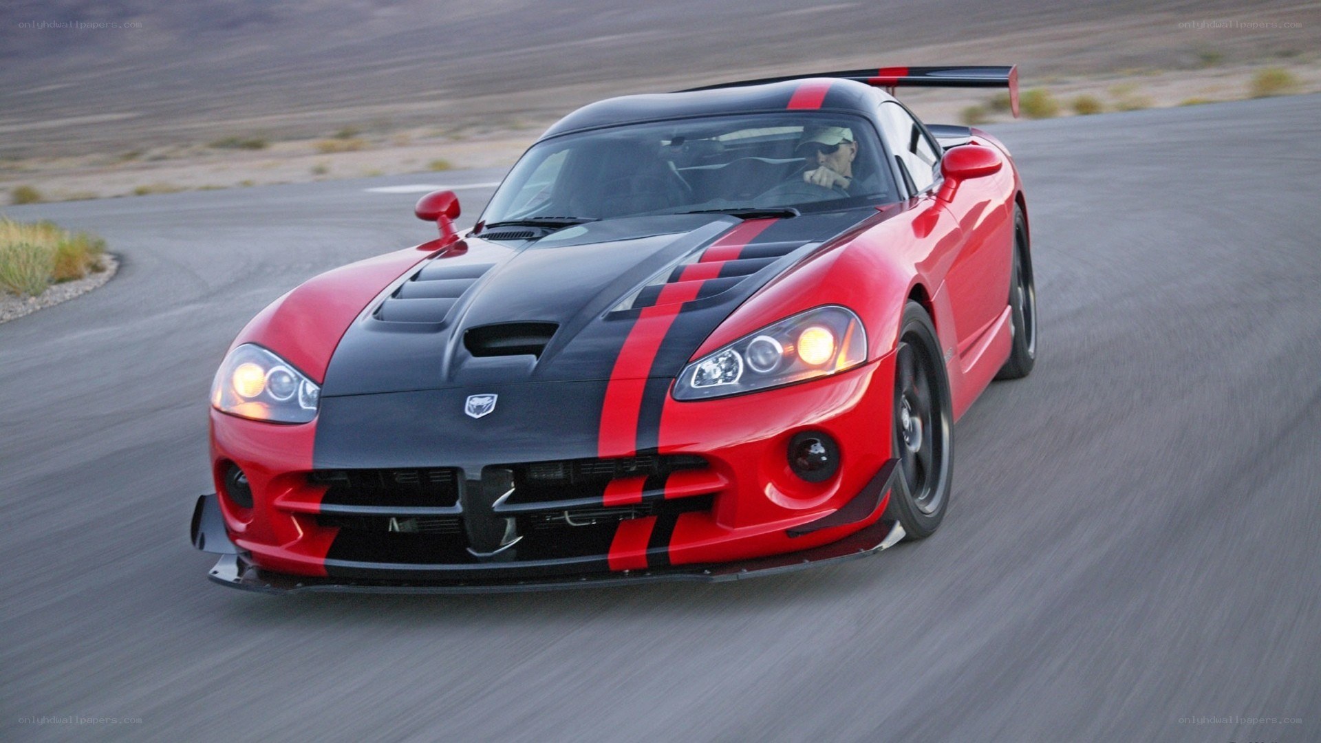 red dodge viper on track