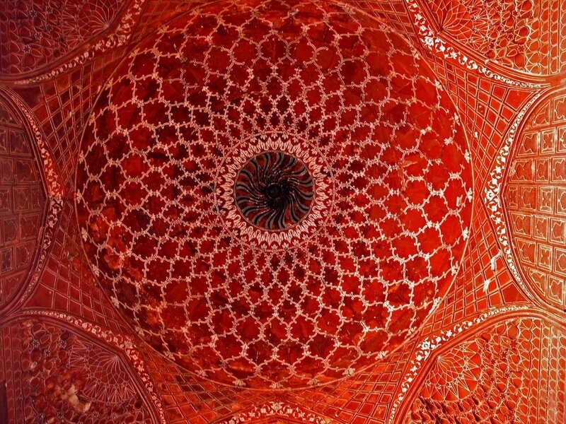 red dome ceiling with intricate patterns