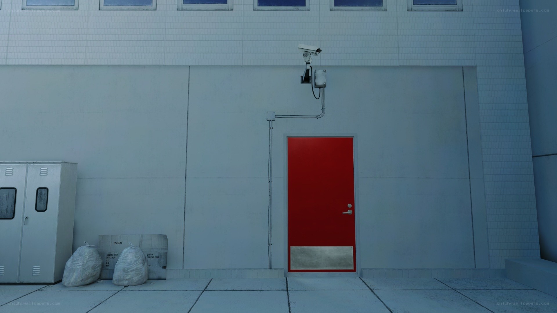 red door with security camera