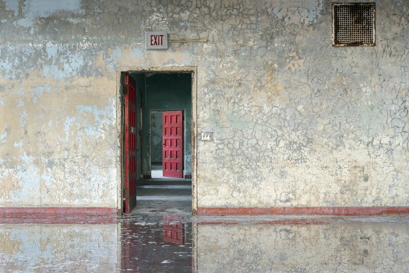 Red Doors in Hallway