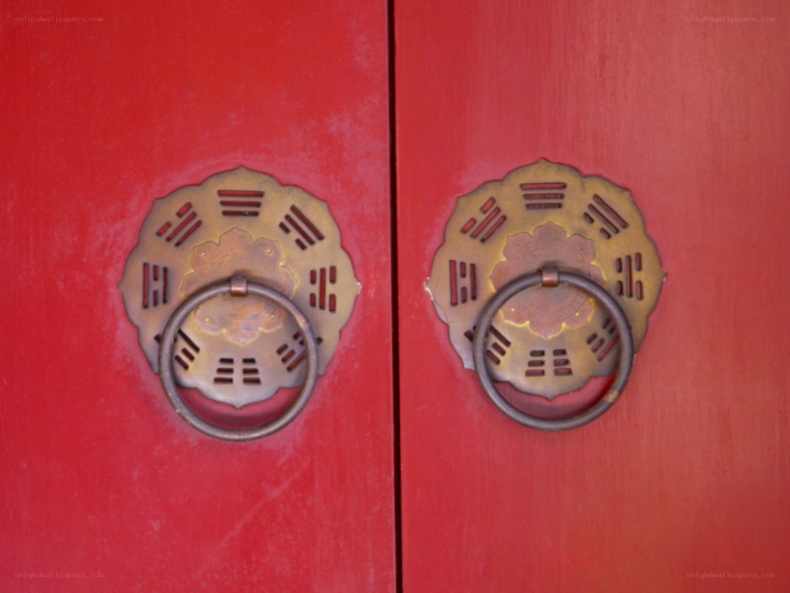Red doors with brass knockers